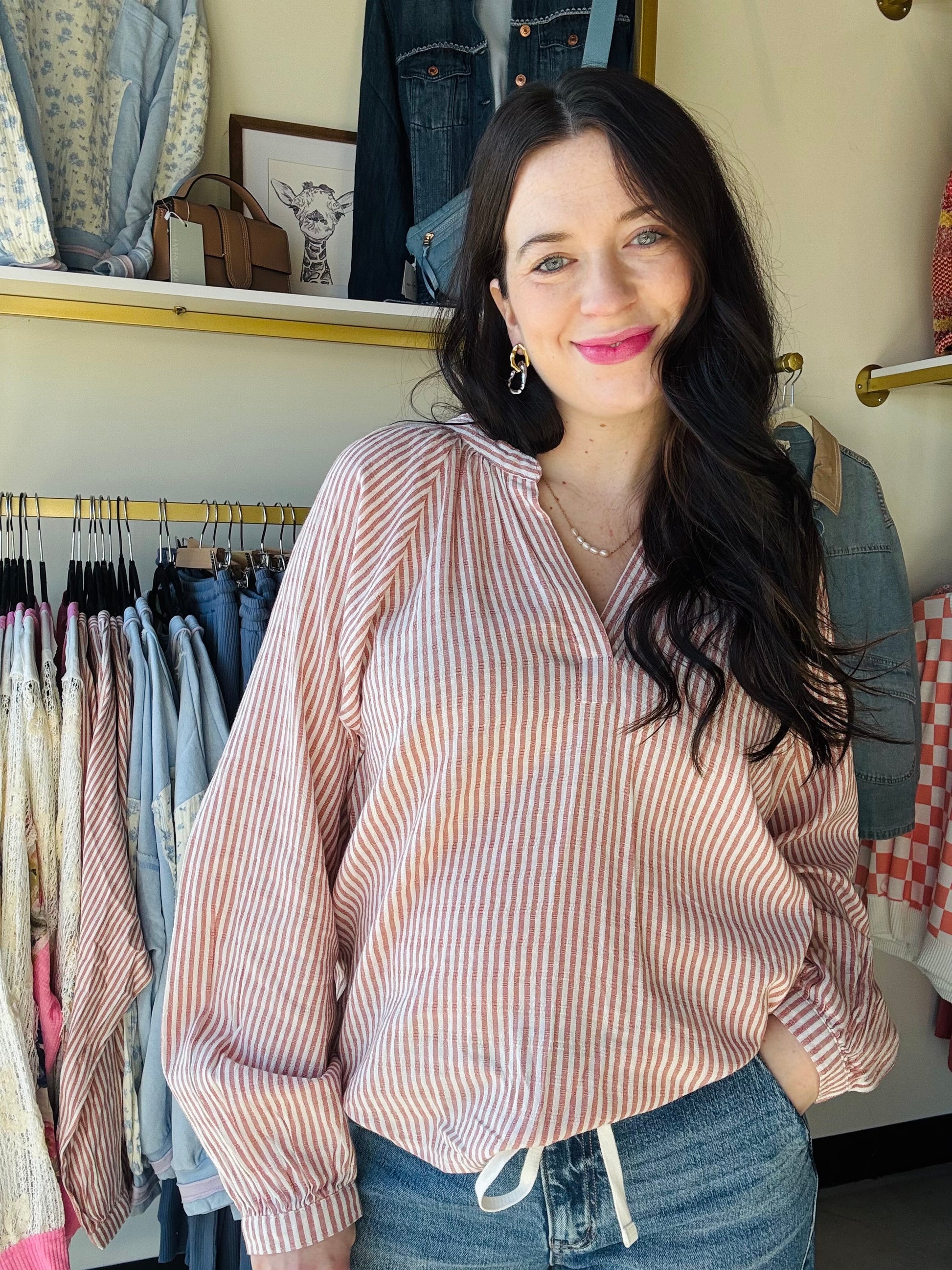 Thread &amp; Supply

So polished and chic, this easy cotton top is featured in a relaxed fit, v neckline and puff sleeve detail for some added style.

V neckline
Raglan sleeves
Measurements for a size small:

Length: 23.5"
Chest: 20"
Sleeve Length: 28.5"
Fabric Content/Care:&nbsp;

55% Cotton
45% Rayon
Machine Wash Cold