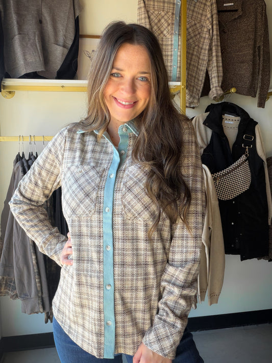 Thread &amp; Supply

The perfect throw-on-the-go layer, this relaxed, button-down top features a soft fabrication with denim trim details, and a plaid design for a timeworn feel.

Collared neckline
Contrast collar &amp; button placket
Full button front closure
Dual chest pockets
Measurements for a size small:

Length: 26.5"
Chest: 19.5"
Sleeve length: 24.5"
Sweep: 20.5"
Fabric Content/Care:&nbsp;

62% Polyester
33% Viscose
5% Elastane
Machine Wash Cold