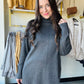 Tribal&nbsp;

Cozy up in this Drop Shoulder Charcoal Turtleneck, designed with ultra-soft rayon nylon yarn to keep you warm and comfy all day. Its long sleeves offer full coverage, perfect for chilly days, while the sleek front accent seam adds a fun modern twist to your look. Easy to wear and impossible to resist!
