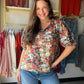Meet your new warm-weather go-to. The Split Neck Daisy Print Popover combines a breezy daisy print with a flattering split neckline for a look that feels effortless from morning coffee to evening plans. Crafted in a soft Rayon/Nylon blend, it drapes beautifully and moves with you all day long.

Split neckline with popover silhouette
Relaxed, easy-to-wear fit
Soft, flowing Rayon/Nylon fabric
Pull-over style — no buttons, no fuss
Pairs perfectly with denim, linen trousers, or your favorite white shorts