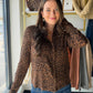Tru Luxe Jeans

Snap-front styling and a bold print make this knit shirt an easy way to add a little edge to any everyday look. Shown here in neutral animal.

Snap front print knit shirt
Fabric: Rayon/Spandex
Color: Neutral Animal
