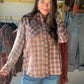 A Fresh Take on Everyday Plaid

Give your everyday outfit a little extra personality with the Mixed Plaid Woven Button Up from Tru Luxe Jeans. The mixed-plaid design puts a playful spin on a classic button-up, making it an easy pick for coffee dates, weekend outings, and casual days when you want to look pulled together.

Make It Your Own

Pair it with your favorite jeans and ankle boots for a classic boutique look, or wear it open over a simple tank for a laid-back layered outfit. Try a front tuck and a fe