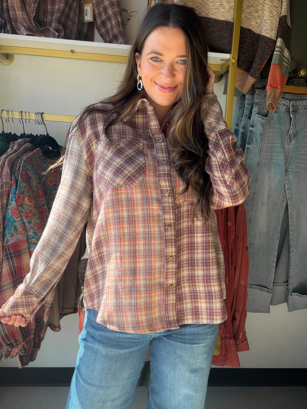 A Fresh Take on Everyday Plaid

Give your everyday outfit a little extra personality with the Mixed Plaid Woven Button Up from Tru Luxe Jeans. The mixed-plaid design puts a playful spin on a classic button-up, making it an easy pick for coffee dates, weekend outings, and casual days when you want to look pulled together.

Make It Your Own

Pair it with your favorite jeans and ankle boots for a classic boutique look, or wear it open over a simple tank for a laid-back layered outfit. Try a front tuck and a fe