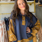Like a favorite autumn memory stitched into fabric. The&nbsp;Navy Plaid Luxeknit Long Sleeve Pullover by Umgee wraps you in buttery-soft LuxeKnit fabrication with a timeless plaid contrast that feels both classic and effortlessly current. The kind of top you'll reach for on every crisp morning, cozy weekend, or low-key night in.

Why You'll Love It

Signature LuxeKnit fabrication — buttery-soft and comfortable all day long
Navy plaid contrast detail — timeless pattern with a modern feel
Long sleeves for eff