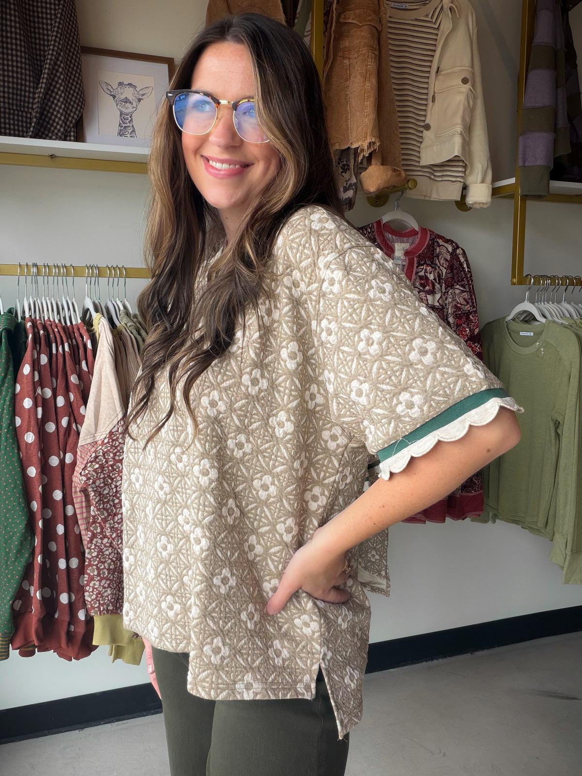 Key Features
• Floral geometric patterned knit top
• Jacquard jersey high low top
• Short wide sleeves
• Contrast scallop trim sleeve detail
• Ribbed round neckline
• Not Lined 


Fabric Contents
• 60% Polyester 
• 37% Rayon
• 3% Spandex
