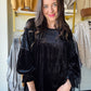 Umgee

Elevate your style with this playful black velvet burnout top, featuring a stunning animal velvet pattern and delicate ladder trim detail. Its soft texture and unique design add a fun twist to any outfit, perfect for those who love mixing comfort with a hint of wild flair.