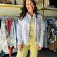 Elevate your everyday rotation with this premium linen-blend button-up featuring effortless raw-edge fringe detailing and a relaxed silhouette. This versatile Antique White staple transitions seamlessly from a polished office look to a breezy coastal layer for the weekend.
