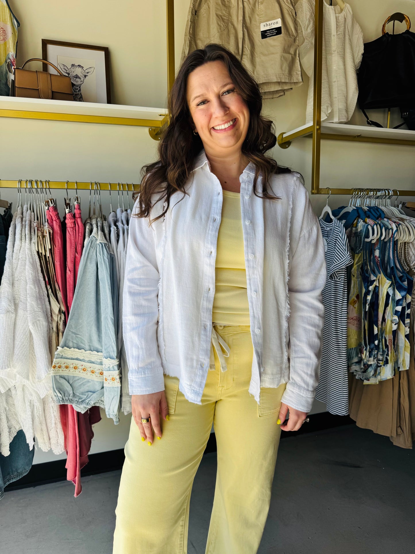 Elevate your everyday rotation with this premium linen-blend button-up featuring effortless raw-edge fringe detailing and a relaxed silhouette. This versatile Antique White staple transitions seamlessly from a polished office look to a breezy coastal layer for the weekend.