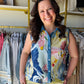 Creations

Shop our Vibrant Abstract Button-Up Tank with stylish denim trim. This sleeveless collared top offers a bold, chic look perfect for summer. Order yours today!

Make a bold statement with this eye-catching abstract print tank featuring a chic denim-collared accent. This lightweight, sleeveless button-up offers an effortless silhouette that transitions perfectly from a polished tucked look to a relaxed summer vibe.

Chic denim-trimmed collar and placket.
Vibrant, artistic abstract print design.
Lig