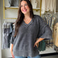 Turn every weekend into a long weekend. The Vintage Charcoal V-Neck Sweater by Cotierra is your new go-to for effortless, cozy style. Made from 100% soft cotton knit, it has that perfectly broken-in feel from the very first wear — the kind of sweater you'll never want to take off.

A classic ribbed V-neckline, casual drop shoulders, and a split hem give it a relaxed, lived-in silhouette that works just as well with jeans as it does with leggings. Ribbed trim on the cuffs, collar, and hem adds a polished fin