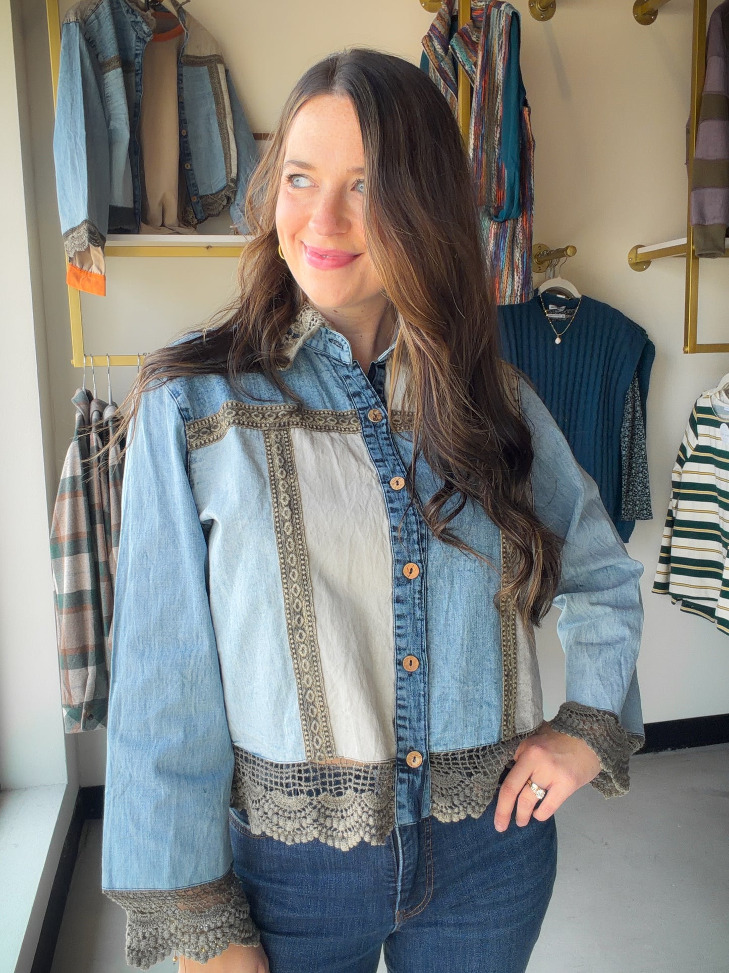 Aqua Western Trim Blouse

A little Western, a little boho, and completely your own. The Aqua Western Trim Blouse brings together mixed denim panels and delicate lace trim for a look that feels effortlessly put-together — whether you're pairing it with your favorite jeans, a flowy skirt, or cutoffs for a weekend out.

Made from 100% cotton denim, it's breathable and comfortable enough for all-day wear across every season. The lace detailing on the yoke, cuffs, and hem adds a feminine touch that sets it apart