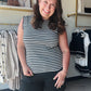 Staccato

Elevate your everyday rotation with this timeless monochromatic striped sweater tank by Staccato. Crafted from premium ribbed knit with elegant accent trim, it offers a flattering, high-end look that transitions perfectly from the office to the weekend.

Premium soft-touch ribbed knit fabric.
Timeless black and white stripes.
Delicate scalloped accent trim details.
Flattering, stretchy form-fitting silhouette.
Versatile transitional layering essential.
Chic sleeveless mock-neck design.