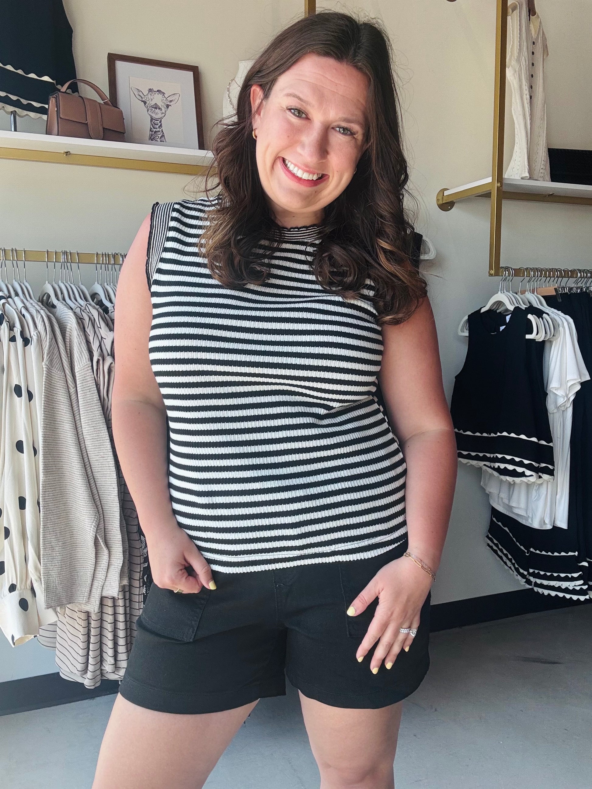 Staccato

Elevate your everyday rotation with this timeless monochromatic striped sweater tank by Staccato. Crafted from premium ribbed knit with elegant accent trim, it offers a flattering, high-end look that transitions perfectly from the office to the weekend.

Premium soft-touch ribbed knit fabric.
Timeless black and white stripes.
Delicate scalloped accent trim details.
Flattering, stretchy form-fitting silhouette.
Versatile transitional layering essential.
Chic sleeveless mock-neck design.