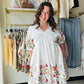 Anniewear

Embrace effortless elegance with this breathable ivory cotton babydoll dress, featuring vibrant floral embroidery and a flattering, flowy silhouette. This boutique-inspired piece combines a breezy V-neck design with whimsical boho charm, making it your go-to outfit for brunch, garden parties, or sun-drenched vacations.

Breathable 100% cotton for all-day comfort.
Flattering babydoll cut suits every shape.
Intricate floral embroidery adds boho flair.
Airy V-neck design keeps you cool.
Versatile st