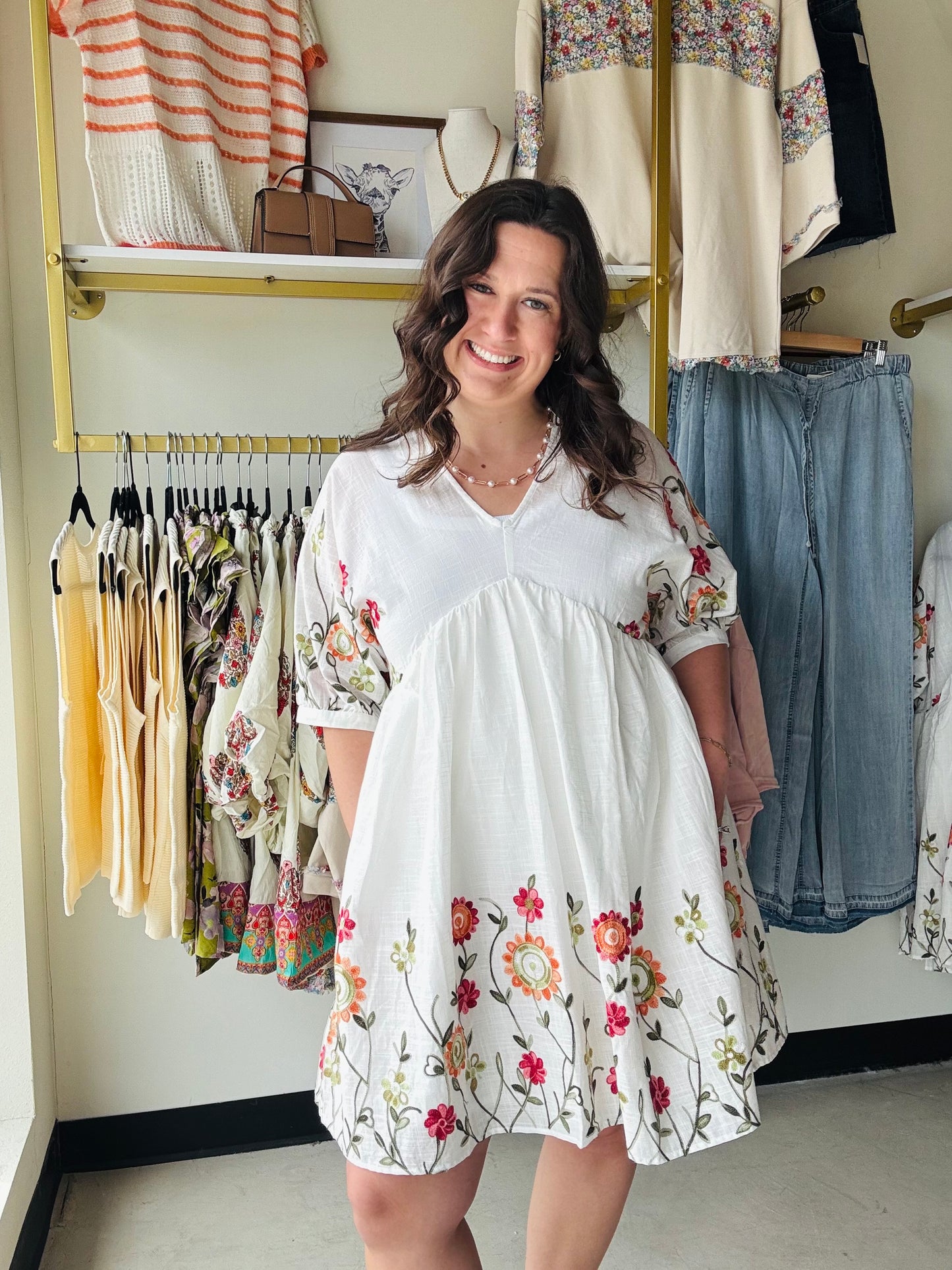 Anniewear

Embrace effortless elegance with this breathable ivory cotton babydoll dress, featuring vibrant floral embroidery and a flattering, flowy silhouette. This boutique-inspired piece combines a breezy V-neck design with whimsical boho charm, making it your go-to outfit for brunch, garden parties, or sun-drenched vacations.

Breathable 100% cotton for all-day comfort.
Flattering babydoll cut suits every shape.
Intricate floral embroidery adds boho flair.
Airy V-neck design keeps you cool.
Versatile st