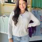 The effortless layer your wardrobe has been waiting for. The White Pointelle Button Down Cardigan by Staccato features delicate pointelle detailing, a classic V-neck, and a full button-down front — equal parts cozy and polished.

In a crisp white and crafted from 100% cotton, this long-sleeve cardigan transitions seamlessly from a breezy summer evening to a cool-weather layering piece. Wear it open as a lightweight topper or buttoned up as a standalone top.

Pointelle knit detailing
Long sleeve, V-neck silh