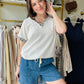 Add a wild twist to your wardrobe with this playful short sleeve top. Crafted from soft rib material, it features a flattering V neckline and eye-catching leopard print trim that brings a fun, fierce vibe to any outfit. Perfect for mixing and matching with your favorite jeans or skirts!