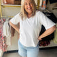 Experience the ultimate lived-in luxury with this ultra-soft, 100% cotton V-neck. Its slouchy, relaxed silhouette and raw-edge detailing deliver an effortless aesthetic for everyday wear.