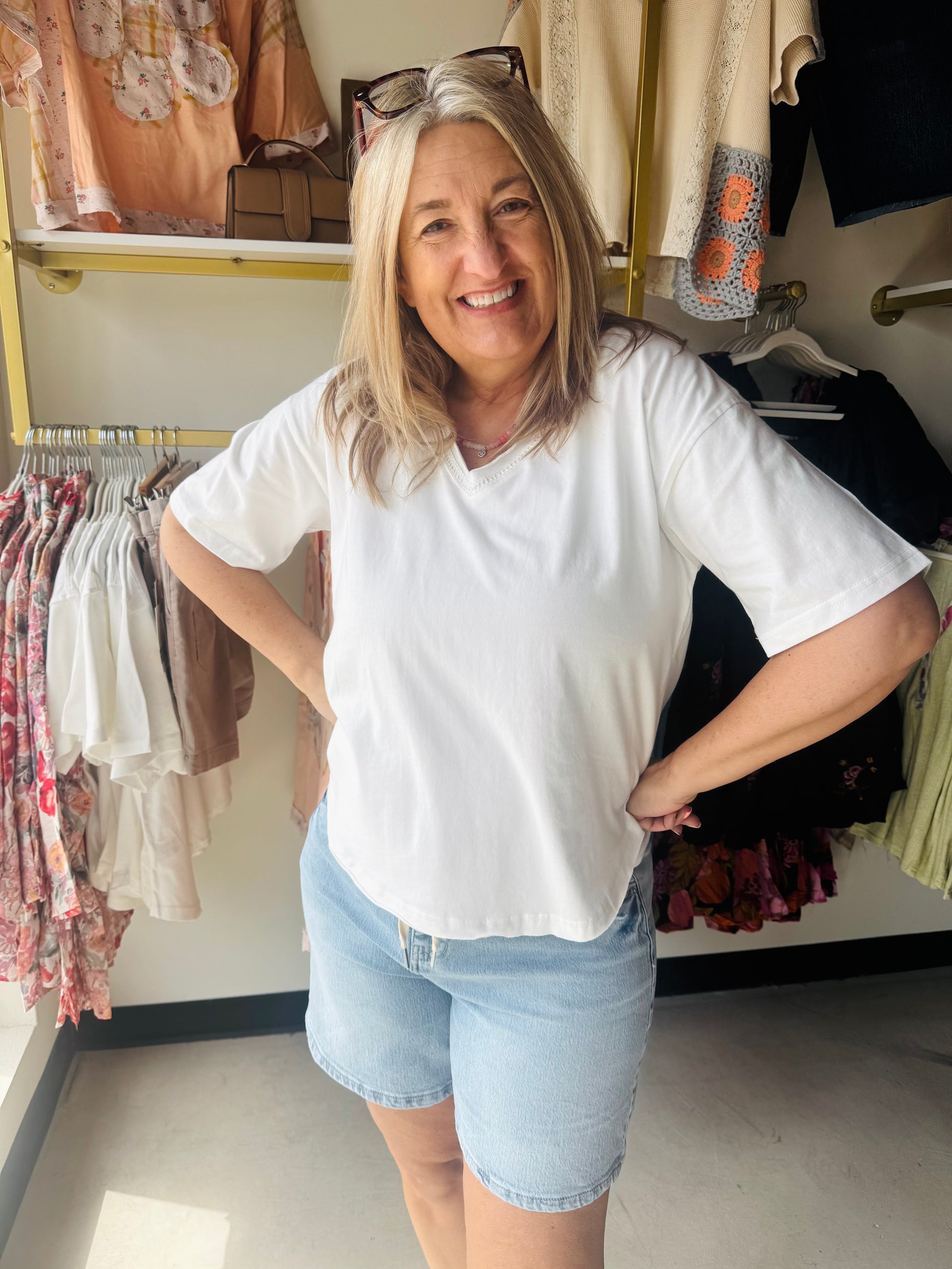 Experience the ultimate lived-in luxury with this ultra-soft, 100% cotton V-neck. Its slouchy, relaxed silhouette and raw-edge detailing deliver an effortless aesthetic for everyday wear.