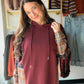 The Plaid Wine Accent Hoodie from Staccato is not your average hoodie. A drawstring hood and long sleeves meet a plaid shirt insert for a layered look without the layers, all in a soft, micro-brushed fabric in rich wine tones. It's the piece that makes a plain Tuesday feel a little more put together.

Why You'll Love It

Drawstring hoodie with long sleeves
Plaid shirt insert adds a layered, mixed-pattern look
Soft, micro-brushed fabric for cozy everyday wear
Rich wine accent palette
Styling Ideas

Throw it 