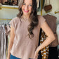 Wishlist&nbsp;

This Dusty Rose Cap Sleeve Sweater features a refined rose hue and vertical ribbing that enhances its tailored silhouette. Crafted from 100% cotton, it offers breathable comfort and durability, making it an ideal choice for layering or standalone wear in transitional seasons. The cap sleeves add a subtle, elegant touch suitable for both casual and polished looks.