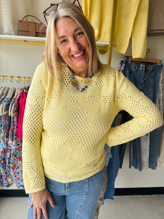 Staccato&nbsp;

Brighten your wardrobe with this charming lemon floral crochet sweater. Featuring delicate flower-like crochet detailing throughout, it combines texture and elegance in one piece. The boat neckline offers a flattering, versatile silhouette, while long sleeves provide warmth and coverage. Perfect for layering or wearing solo, this sweater brings a fresh, handcrafted aesthetic to casual and dressed-up looks alike.
