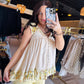 POL

Upgrade your basics with this ultra-soft thermal tank featuring delicate lace and vibrant yellow floral accents. The relaxed fit and feminine ruffle hem deliver effortless boho-chic style perfect for high-impact layering or stand-alone wear

Ultra-soft thermal fabric for all-day comfort.
Feminine lace and floral trim details.
Flattering relaxed fit for every body.
Effortlessly pairs with denim or skirts.
Perfect for year-round layering potential.
Playful contrast ruffle hem finish.
