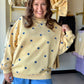 Embrace effortless boho charm with this buttery yellow terry pullover featuring playful navy polka dots. Crafted from ultra-soft fabric with a relaxed silhouette, it’s the ultimate high-comfort essential for your everyday wardrobe.

Ultra-soft premium French terry fabric.
Relaxed, oversized boho-chic fit.
Playful all-over navy polka dots.
Breathable comfort for all-day wear.
Classic ribbed cuffs and neckline.
Versatile styling for effortless looks.

