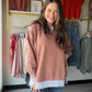 Bold color meets effortless comfort. The&nbsp;Acid Wash Pullover by Zenana is a cozy fleece pullover with serious personality. The rich rust hue gets an artisan edge from the acid wash treatment, meaning every piece is one-of-a-kind — no two are exactly alike. Contrast trim detailing and side slits add thoughtful finishing touches that keep it feeling fresh and fashion-forward.

Made from a soft cotton-poly fleece blend, it's the kind of pullover you'll live in all season long. Oversized and relaxed, it pai