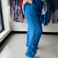 Creations&nbsp;

Lightweight blue crinkle pants designed for warm weather comfort. Features drawstring waist for an adjustable fit and decorative button details along the legs. The breathable fabric keeps you cool during summer months, while the relaxed silhouette offers easy movement. Perfect for casual outings, beach trips, or laid-back days.