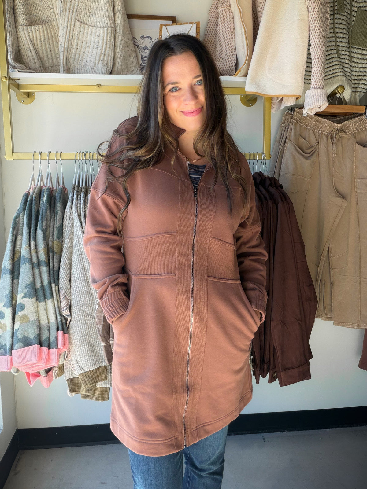 Your Casual-Day Outfit Starts Here

Meet the Brown Zip Up Tunic by Doe &amp; Rae, a classic brown piece with a zip-up design that brings a sporty touch to your everyday wardrobe. Its tunic styling gives you a fresh alternative to a basic top, while the brown shade makes outfit pairing simple.

From your morning coffee run to a laid-back afternoon with friends, style it with leggings and sneakers for an easy casual look. Prefer denim? Pair it with slim jeans and ankle boots, then add a crossbody bag to finis