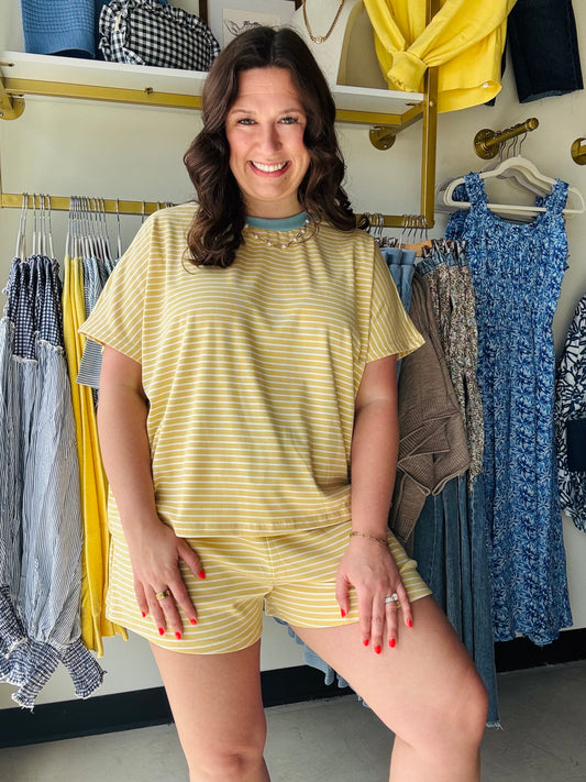 Anniewear

Experience cloud-like comfort in our buttery-soft striped lounge top. Featuring a breezy dolman sleeve and chic contrast neckline, this tee redefines effortless everyday style. It’s the ultimate "wear-everywhere" staple for those who refuse to sacrifice comfort for fashion

Buttery-soft, premium breathable fabric.
Relaxed dolman sleeves for comfort.
Trendy yellow and white stripes.
Stylish blue contrast crew neck.
Effortless fit for all-day wear.
Perfect for lounging or errands.
Designed for long