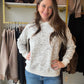A little puppy personality makes an everyday outfit more fun. The Dog Sketch Sweatshirt by SM Wardrobe brings a dog-inspired sketch theme to your casual wardrobe, paired with a fleece-lined interior for those cozy-day plans. Whether you’re a proud dog mom or simply can’t resist a four-legged friend, this one adds a playful touch to your sweatshirt rotation.

Picture a slow morning with coffee, your favorite jeans, and your pup waiting by the door. Slip this sweatshirt into your weekend lineup for a neighbor