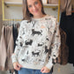 For the cat lover with a soft spot for storybook charm, the Whimsical Cat Forest Sweatshirt by SM Wardrobe brings a playful touch to your casual wardrobe. Its cat-and-forest theme gives your everyday look a little personality, while a fleece-lined interior adds an inviting layer for those stay-cozy kind of days.

Imagine a leisurely morning with your favorite mug, a good book, and nowhere to rush. Then, when the afternoon calls for a coffee date or a stroll through town, pair this sweatshirt with your go-to