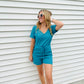 This Ribbed Abby Romper offers all-day comfort and style. Made of a lightweight fabric, it features a drawstring waistband, scoop neck neckline, and a casual, cute look. Perfect for pairing with a blazer or jean jacket and sneakers. Enjoy effortless style and comfort. 