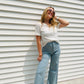 This White V Neck Jersey Knit Tee is perfect for any casual occasion. It is made of breathable jersey knit fabric for comfort, and the raw cut edge finishing provides a sleek, contemporary look. Plus, the chest pocket and exposed center seams add to its classic style. An ideal combination of comfort and style.