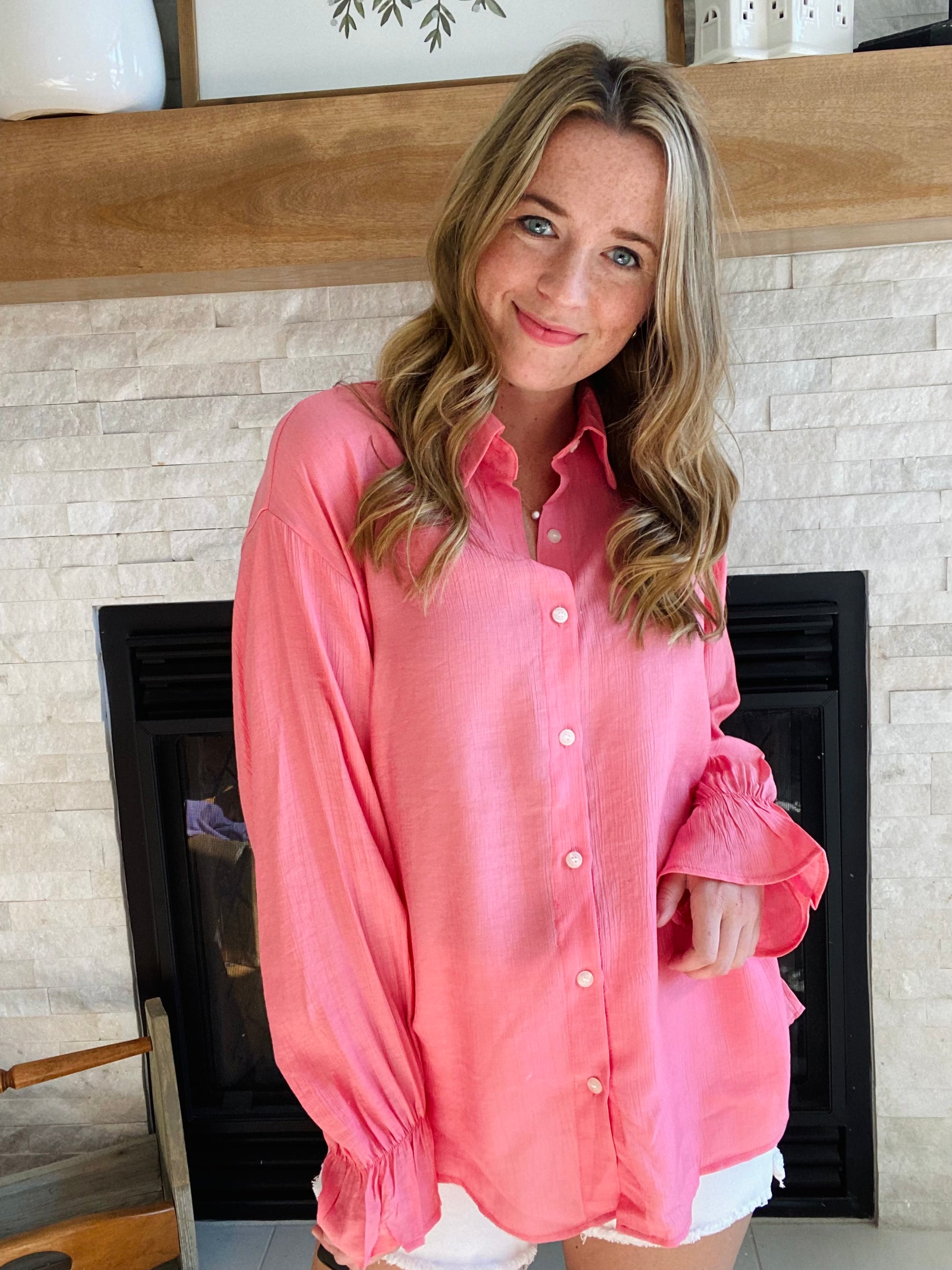 This Gauzy Bell Sleeve Blouse is crafted from lightweight polyester and spandex for an ultra-airy feel and relaxed fit. This blouse features baby bell sleeves and a collar, with functional buttons to ensure a perfect fit. The gauze fabric has a mild sheerness for an elegant look.