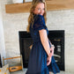 This Nacy Lace Sleeve Smocked Dress is perfect for any occasion. Crafted from high-quality fabric, this country chic style dress features a cinched smocking waistline and delicate lace sleeve detail to make you look and feel your best. Ideal for the office or a summer barn wedding.