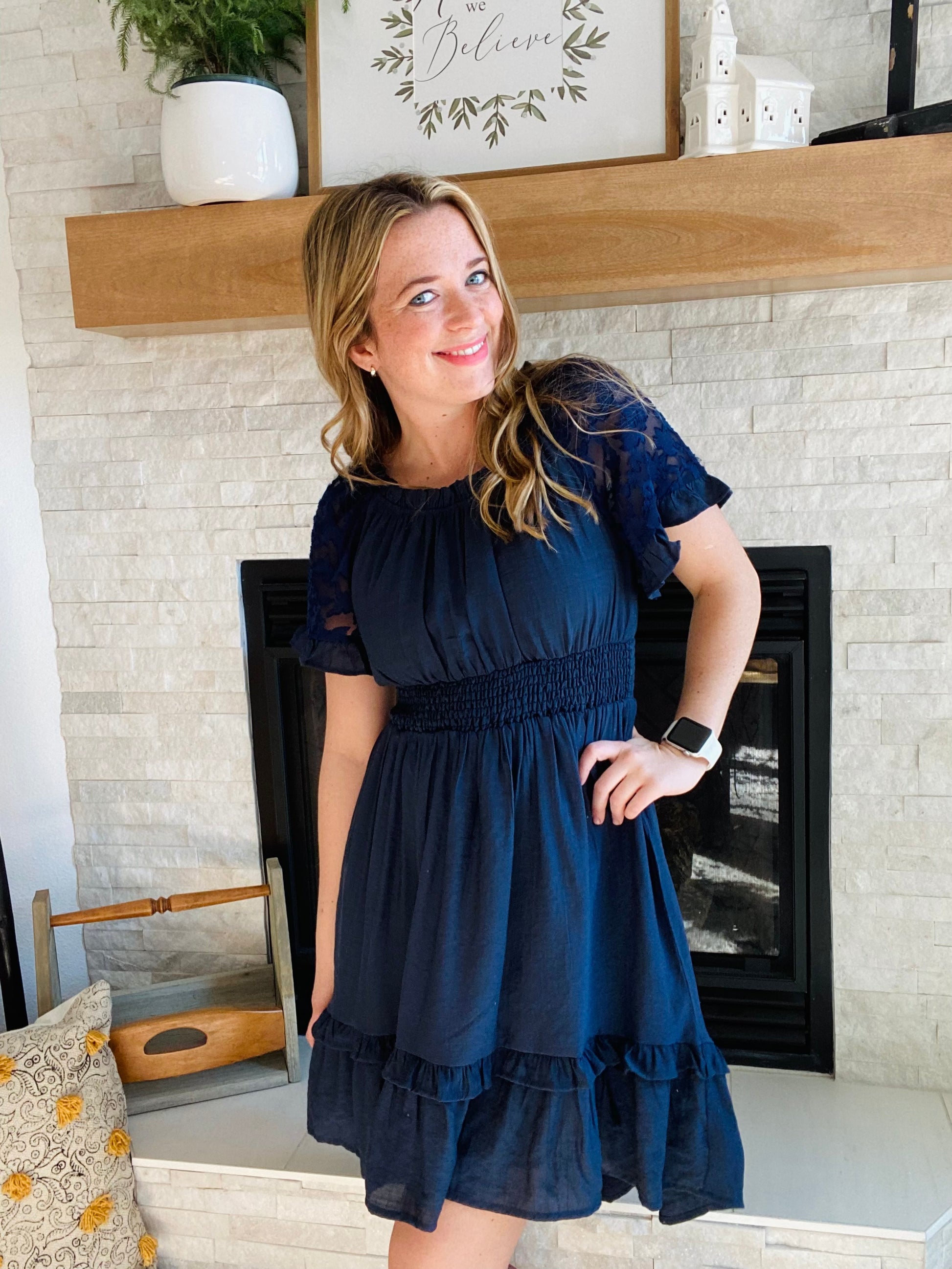 This Nacy Lace Sleeve Smocked Dress is perfect for any occasion. Crafted from high-quality fabric, this country chic style dress features a cinched smocking waistline and delicate lace sleeve detail to make you look and feel your best. Ideal for the office or a summer barn wedding.