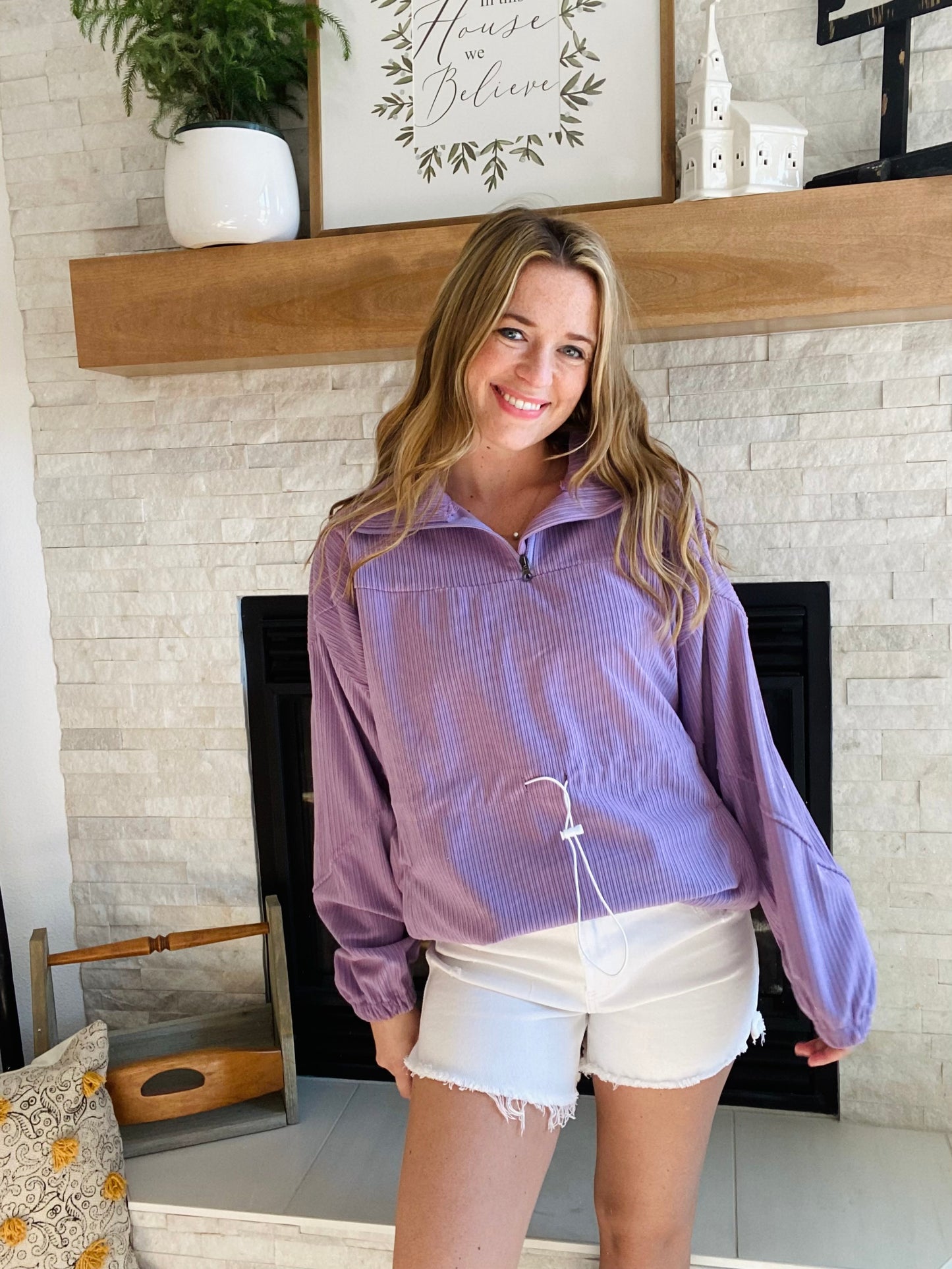 Stay warm and cozy outdoors with the Purple Toggle Tie Pullover. Constructed of durable corduroy and featuring a functional zip collar and pocketed design, this sweater is perfect for both camping and hiking. With unique diagonal seam embellishments and toggle tie drawings, you'll stand out in the camping crowd while looking your bes