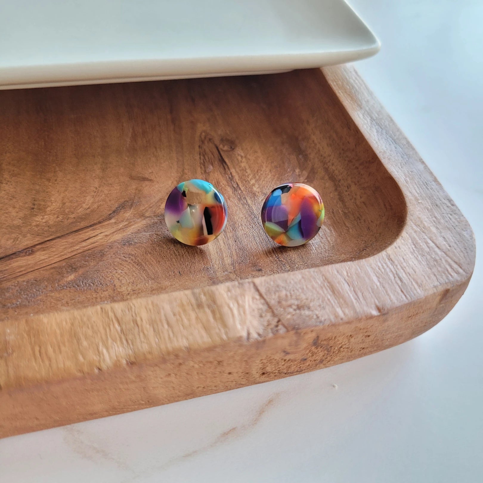 Our classic Sophie Stud Earrings are circle-shaped studs that come in a variety of colors. These earrings are perfect for everyday wear, and the simple design makes them versatile enough to pair with any outfit.  These studs are made with high-quality materials, ensuring they will be a staple in your jewelry collection for years to come.