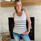 Stay cool this summer with this White Shell Rib Knit Tank Top. This tank top is designed with a rib knit and scalloped detail trim for a comfortable and stylish look. The black stripes are very classic and match almost every bottom. It also features a functional button detail to complete the look. The fabric is lightweight, breathable and perfect for hot summer days.